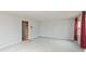 Cozy living room with neutral paint, carpet flooring, and natural light from a nearby window at 2830 Moller Rd, Indianapolis, IN 46224