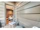 Balcony with seating that leads to a room with a comfortable bed at 319 E 16Th E St # 201, Indianapolis, IN 46202