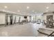 Spacious gym with windows and an array of weight training and cardio machines at 319 E 16Th E St # 201, Indianapolis, IN 46202
