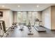 Large gym featuring weight training equipment and a treadmill at 319 E 16Th E St # 201, Indianapolis, IN 46202