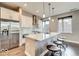 Modern kitchen with stainless steel appliances, a spacious island, and barstool seating at 319 E 16Th E St # 201, Indianapolis, IN 46202