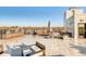 Contemporary roof deck with outdoor furniture and community views, perfect for relaxing or entertaining at 319 E 16Th E St # 201, Indianapolis, IN 46202