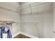 Walk-in closet space offers ample storage with multiple shelves at 319 E 16Th E St # 201, Indianapolis, IN 46202