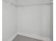 Empty closet with wire shelving and gray carpet at 319 E 16Th St # 302, Indianapolis, IN 46202