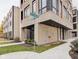 Modern building exterior showcasing brick facade and architectural details at 'The 19 The Old Northside' at 319 E 16Th St # 302, Indianapolis, IN 46202