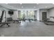 Gym with various exercise machines, weights, and a tv at 319 E 16Th St # 302, Indianapolis, IN 46202