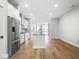 Modern kitchen featuring stainless steel appliances, island with seating, and open layout at 319 E 16Th St # 302, Indianapolis, IN 46202