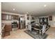 Open concept kitchen and dining area featuring stainless steel appliances and unique furniture at 3219 E Maygrove Dr, Danville, IN 46122