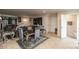This open-concept living room and kitchen features modern decor and plenty of natural light at 3219 E Maygrove Dr, Danville, IN 46122
