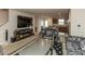Open-concept living room and kitchen featuring unique furniture, decorations, and lighting at 3219 E Maygrove Dr, Danville, IN 46122