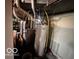 View of water heater and HVAC system in unfinished utility area at 3337 Nottingham Dr, Columbus, IN 47203