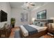 Comfortable bedroom features a large window, a cozy bed, and stylish decor at 355 E Ohio E St # 206, Indianapolis, IN 46204