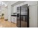 Clean kitchen with stainless refrigerator and white cabinetry, offering a sleek and modern design at 355 E Ohio E St # 206, Indianapolis, IN 46204