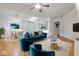 Bright, open living room with stylish decor, hardwood floors, and modern furnishings at 355 E Ohio E St # 206, Indianapolis, IN 46204