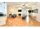 Bright living room featuring a fireplace, ceiling fan, and access to a balcony at 355 E Ohio E St # 206, Indianapolis, IN 46204