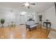 Open-concept living space with hardwood floors and modern furniture perfect for entertaining guests at 355 E Ohio E St # 206, Indianapolis, IN 46204