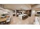 Spacious kitchen with waterfall island, pendant lighting, integrated refrigerator, and stainless steel appliances at 4094 Chapel Hill Ct, Bargersville, IN 46106