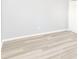 Bright bedroom features modern light wood flooring and a large closet at 4123 S Lynhurst Dr, Indianapolis, IN 46221