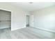 Spacious bedroom features a walk-in closet and a view into another room at 4408 W Preserve Pass, New Palestine, IN 46163