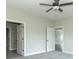 Bedroom offers multiple entryways and a view of other rooms, creating an open and inviting layout at 4408 W Preserve Pass, New Palestine, IN 46163