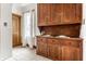 Charming built-in hutch with drawers, cabinets and shelving, plus a window view, in a well-lit kitchen area at 4644 Cornelius Ave, Indianapolis, IN 46208