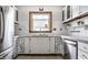 Bright kitchen featuring a garden window, white cabinets, stainless steel appliances and butcher block countertops at 4644 Cornelius Ave, Indianapolis, IN 46208