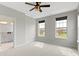 Bright bedroom with ensuite bathroom, featuring multiple windows and neutral tones at 517 Steinbeck Pl, Carmel, IN 46032