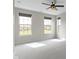 Spacious bedroom with large windows offering natural light and a cozy atmosphere at 517 Steinbeck Pl, Carmel, IN 46032