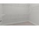 Walk-in closet with carpet flooring and white wire shelving at 517 Steinbeck Pl, Carmel, IN 46032