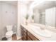 Bathroom features a white vanity and a glass door shower at 556 Gibson Dr, Westfield, IN 46074