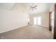 Bright bedroom featuring high ceiling and sliding glass doors at 556 Gibson Dr, Westfield, IN 46074