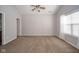 An empty bedroom with a ceiling fan and natural light at 556 Gibson Dr, Westfield, IN 46074