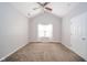Bright bedroom features a vaulted ceiling, ceiling fan, and a window for natural light at 556 Gibson Dr, Westfield, IN 46074