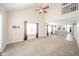 Spacious living room featuring high ceiling, neutral walls, and plush carpet at 556 Gibson Dr, Westfield, IN 46074
