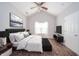Spacious primary bedroom with a ceiling fan, vaulted ceiling and a large window at 556 Gibson Dr, Westfield, IN 46074