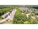 Community featuring well-maintained townhomes surrounded by mature trees and landscaping at 651 Greenford N Trl, Carmel, IN 46032