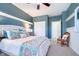Comfortable bedroom featuring a king-size bed, vibrant pillows, and an inviting serene atmosphere at 651 Greenford N Trl, Carmel, IN 46032