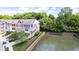 Beautiful townhome situated along a scenic pond with landscaped grounds and a private entrance at 651 Greenford N Trl, Carmel, IN 46032
