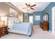 A well-lit main bedroom with stylish decor, carpet flooring, and neutral-colored walls at 651 Greenford N Trl, Carmel, IN 46032