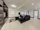 Finished basement with tile flooring, stylish decor, and ample space for entertaining or relaxing at 6780 N Michigan Rd, Fairland, IN 46126