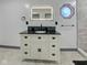 A lovely vanity is topped with a black stone countertop and black fixtures at 6780 N Michigan Rd, Fairland, IN 46126