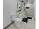 Bathroom with modern fixtures, walk-in shower, stylish floor, and granite topped vanity at 6780 N Michigan Rd, Fairland, IN 46126