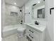 A clean bathroom has a shower, vanity and toilet at 6780 N Michigan Rd, Fairland, IN 46126