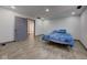 Bedroom with laminate flooring, neutral walls, and an ensuite bathroom at 6780 N Michigan Rd, Fairland, IN 46126