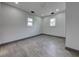 This bedroom features two large windows to let in natural light at 6780 N Michigan Rd, Fairland, IN 46126