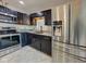 Updated kitchen with stainless steel appliances, granite countertops, and stylish backsplash at 6780 N Michigan Rd, Fairland, IN 46126