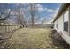 Large, fenced backyard provides privacy and space for recreation, features a shed for storage, and room for outdoor activities at 7031 Sea Eagle Ct, Indianapolis, IN 46254