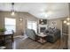 Open concept living area featuring a brick fireplace, dining area, and lots of natural light at 7031 Sea Eagle Ct, Indianapolis, IN 46254