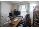 Office space featuring a large desk, monitors, and a comfortable chair at 7031 Sea Eagle Ct, Indianapolis, IN 46254