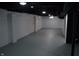 Unfinished basement with painted concrete floor, white walls, and black ceiling at 7144 Sandalwood Dr, Indianapolis, IN 46217